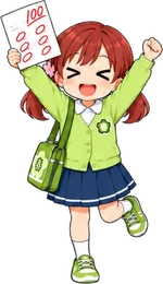 100点の答案を掲げるハルちゃん