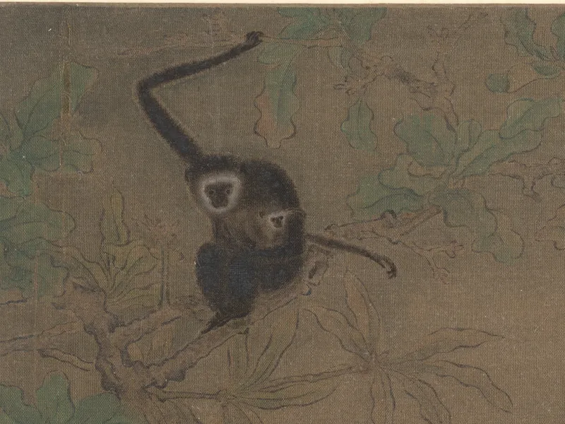 木の枝の上で、黒い毛の親猿が、子猿をおなかに抱いてこちらを見ている昔の絵