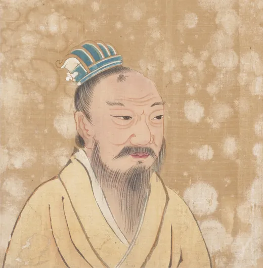 青い冠をつけ、長いひげをはやした年配の男の人の肖像画
