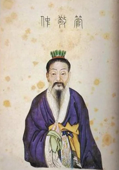 冠をかぶり、紫の衣を着て、白く長いひげをたくわえた老人の上半身の肖像画。上に「管敬仲」と書かれている